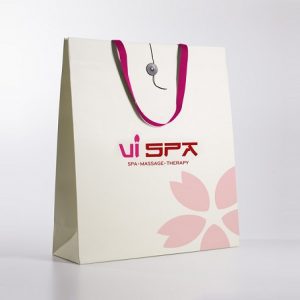 Gam màu hồng, trắng được chọn lựa để thiết kế túi giấy cho cơ sở làm đẹp